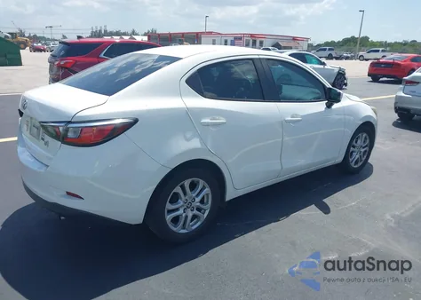 2018 Toyota Yaris Ia из США, поврежденный, VIN 3MYDLBYV2JY300619